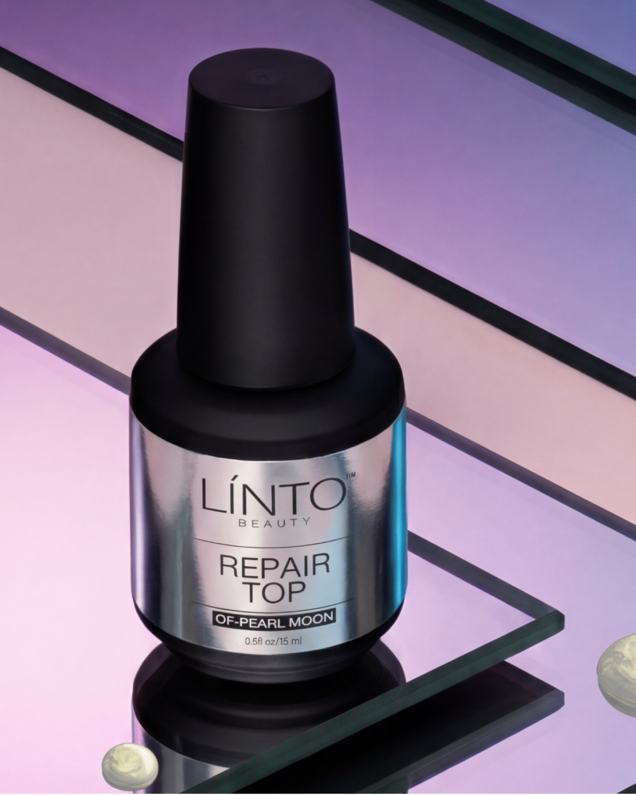 Linto Beauty repair top coat bottle on a reflective surface with a purple gradient background